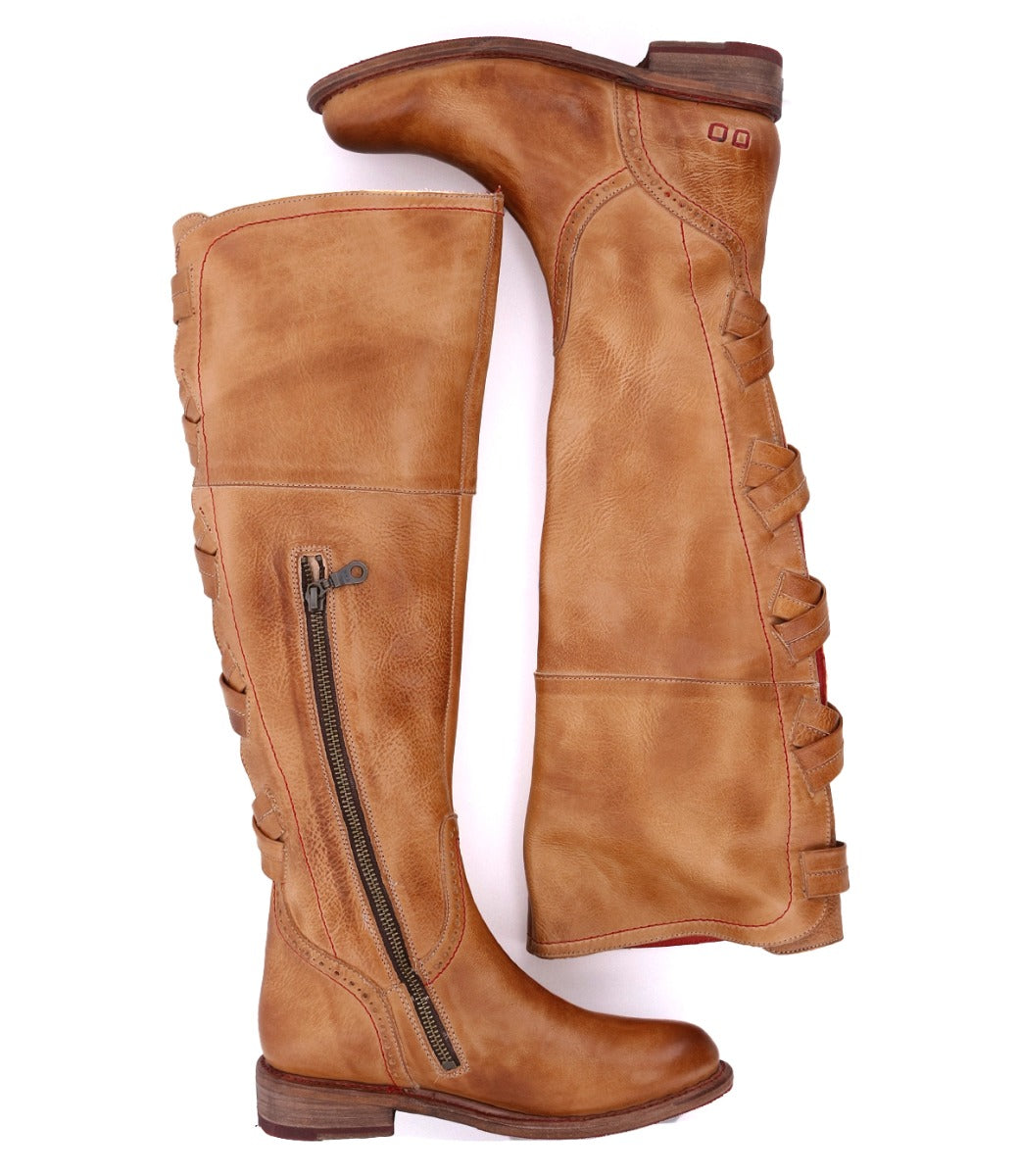 A pair of Bed Stu Rochelle boots with zippers on the side.