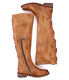 A pair of Bed Stu Rochelle boots with zippers on the side.