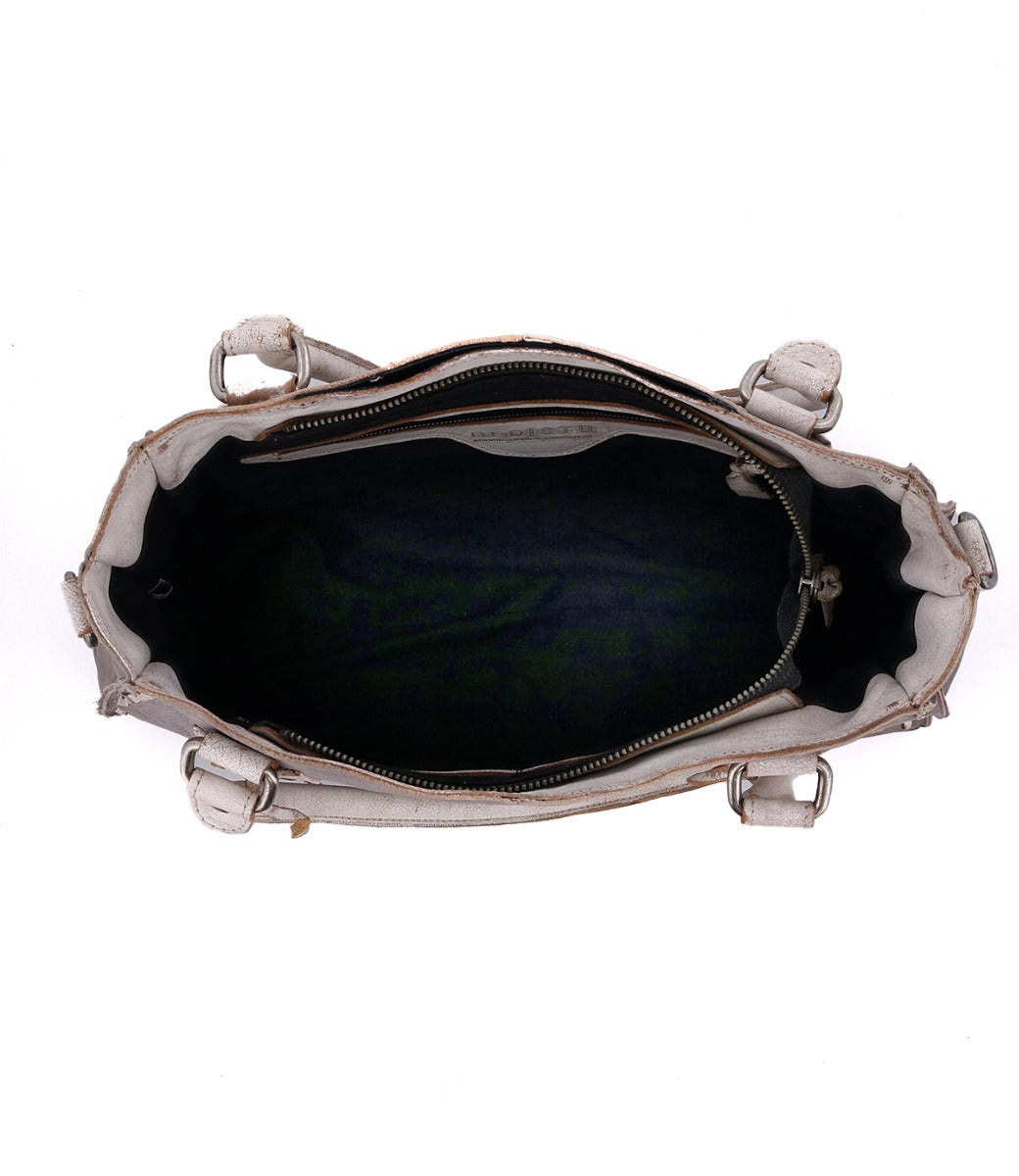 The inside of a Rockababy vegetable tanned leather handbag made by Bed Stu.