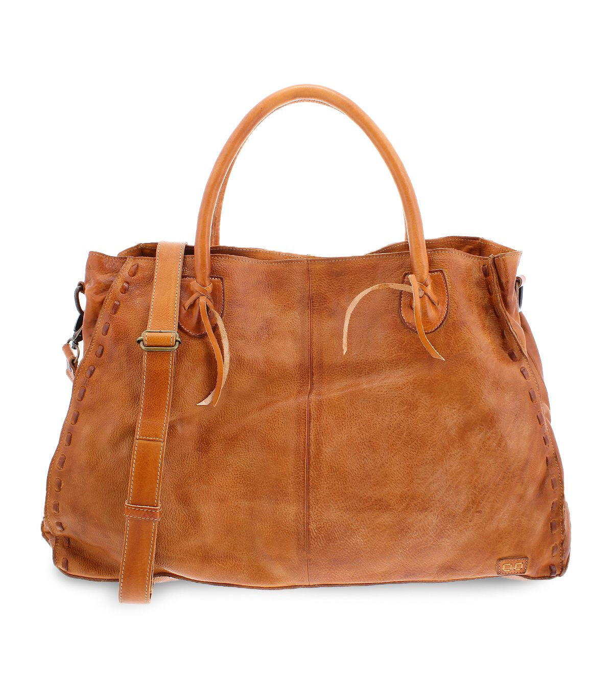 The Rockaway by Bed Stu is a fan favorite tan leather handbag featuring dual handles, an adjustable shoulder strap, and a stitched design along the edges. For added convenience, it also includes a zip-pocket divider.