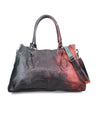 A black leather Rockaway handbag with a shoulder strap. (Brand: Bed Stu)
