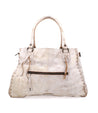A Rockaway handbag from Bed Stu, made of white leather with a zipper.