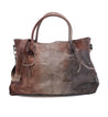 A brown leather Rockaway tote bag with handles from Bed Stu.