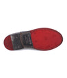 A men's Rose shoe with Bed Stu red and black soles.