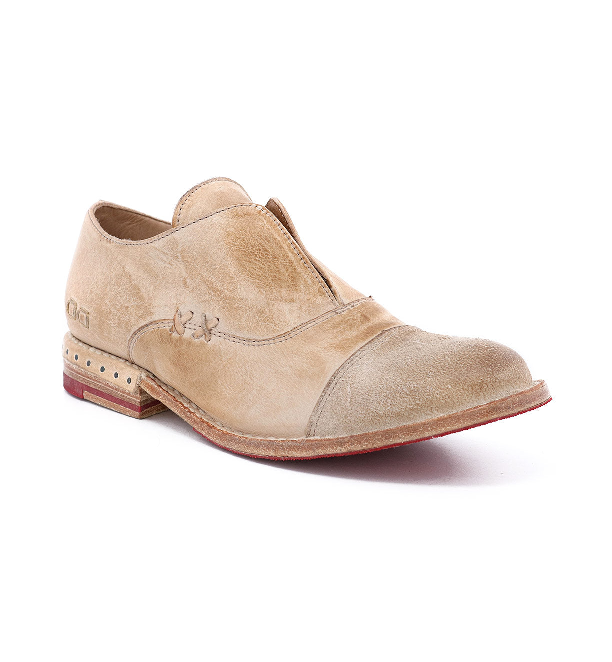 A pair of Bed Stu Rose shoes with a leather sole.