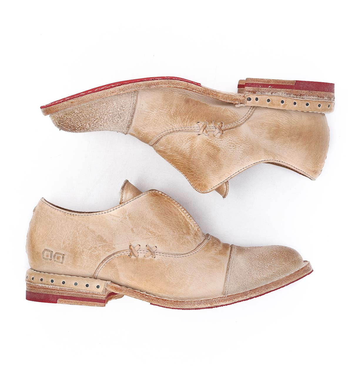 A pair of Rose shoes with red soles from Bed Stu.