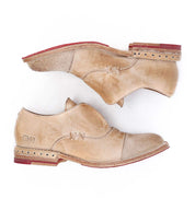 A pair of Rose shoes with red soles from Bed Stu.