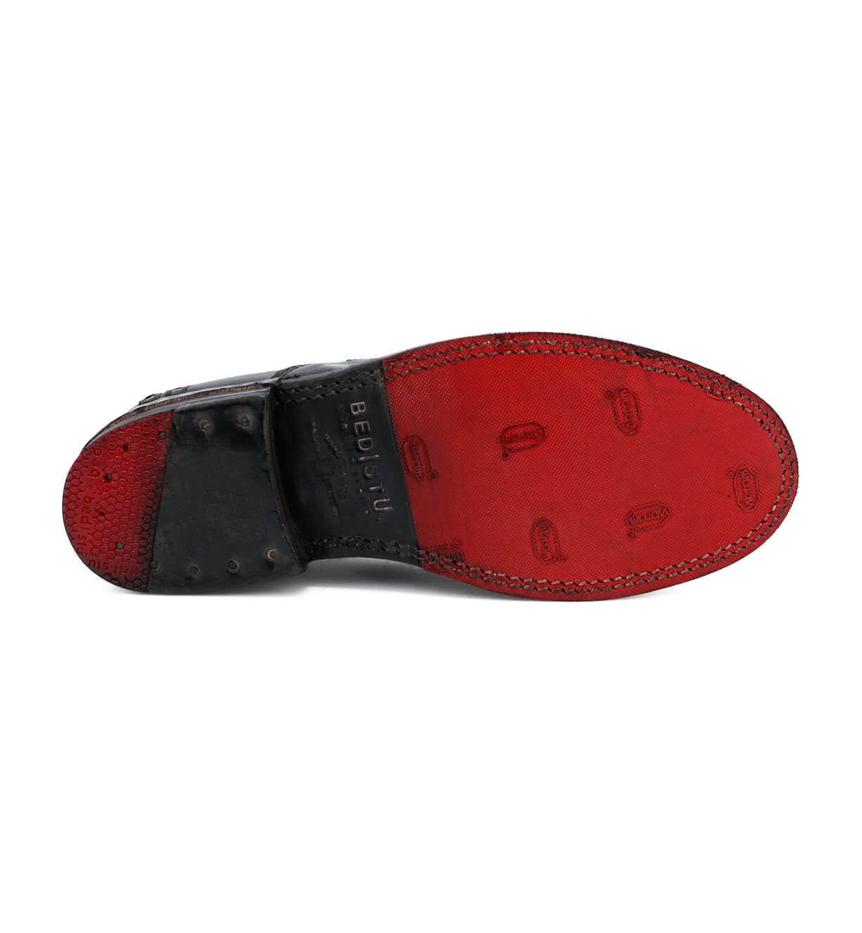 A pair of black and red Rose shoes with studs on the sole by Bed Stu.