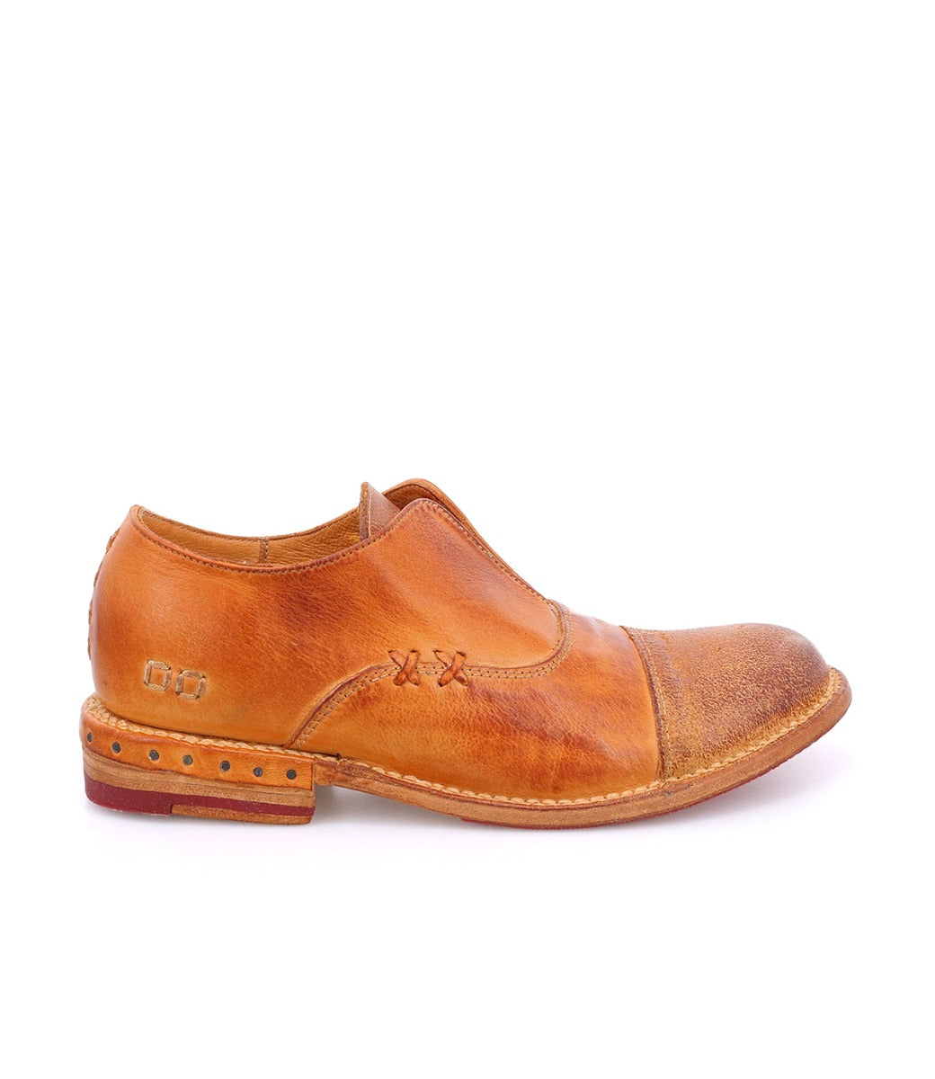 A men's brown leather Rose shoe with a tan sole by Bed Stu.