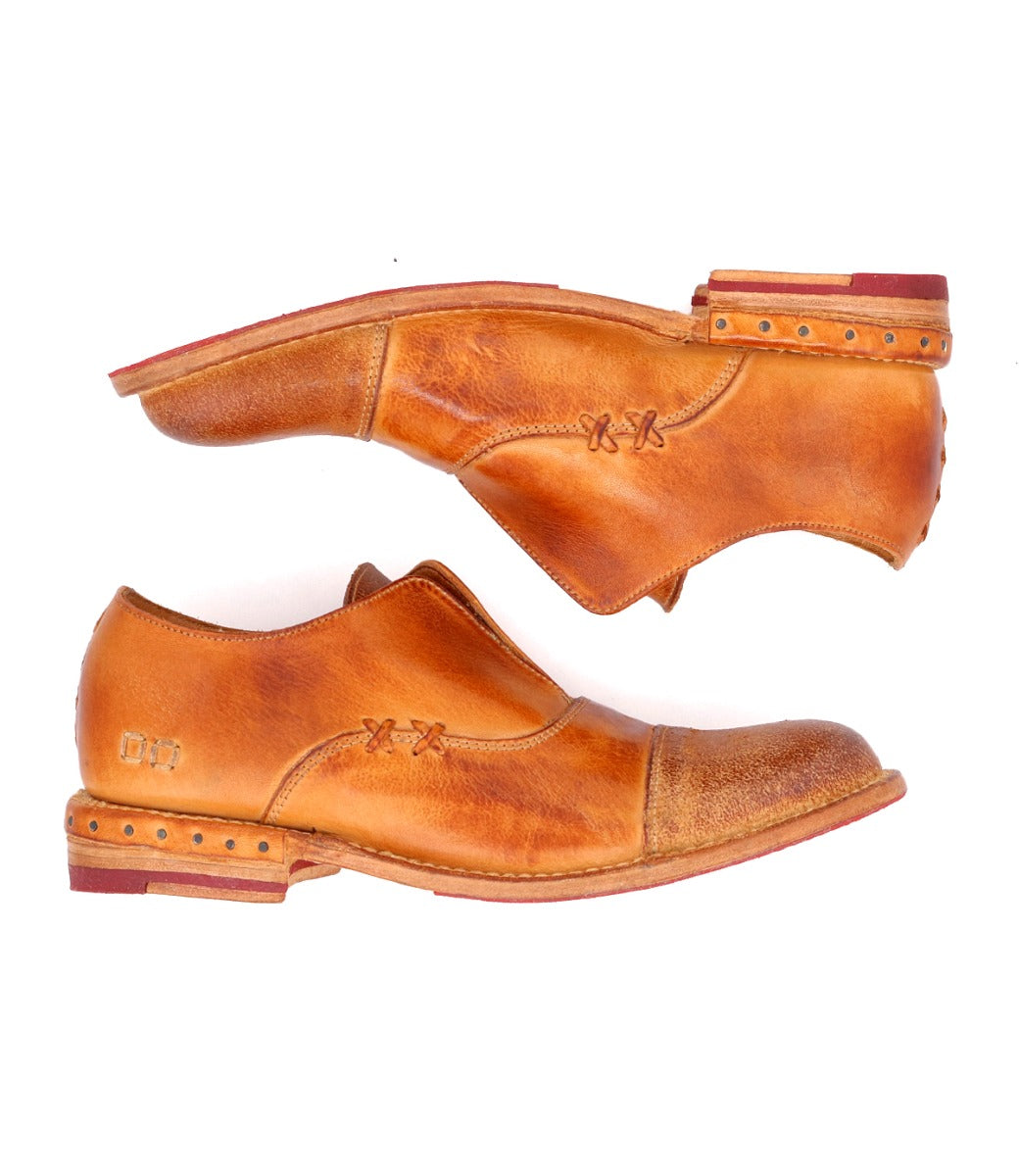 A pair of men's Rose shoes with Bed Stu tan soles.