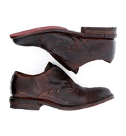 A pair of Bed Stu Rose brown leather shoes on a white background.