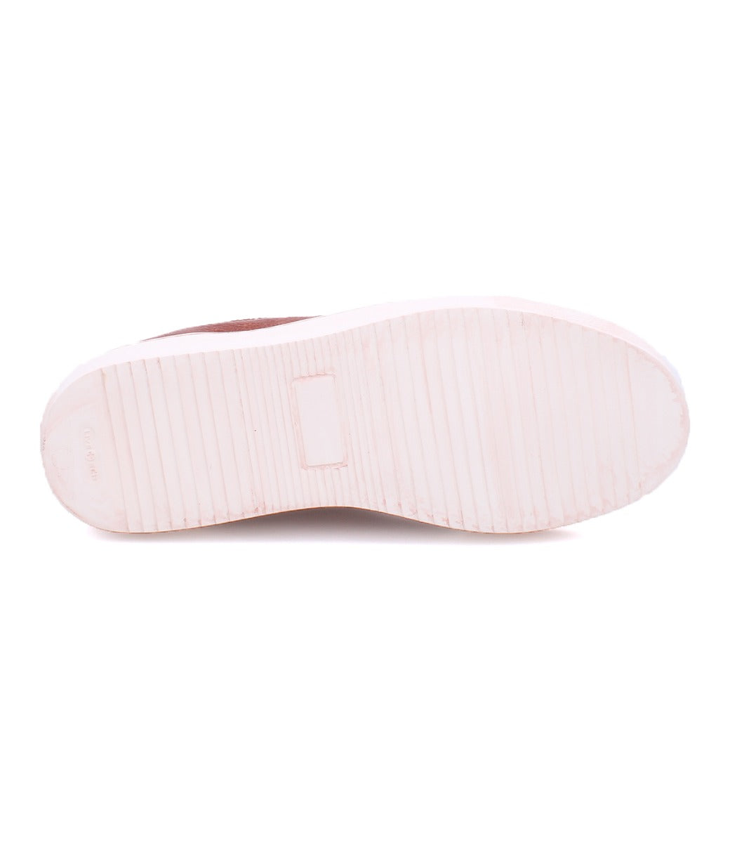 A pair of Rossela shoes with a white sole and a pink sole, made by Bed Stu.