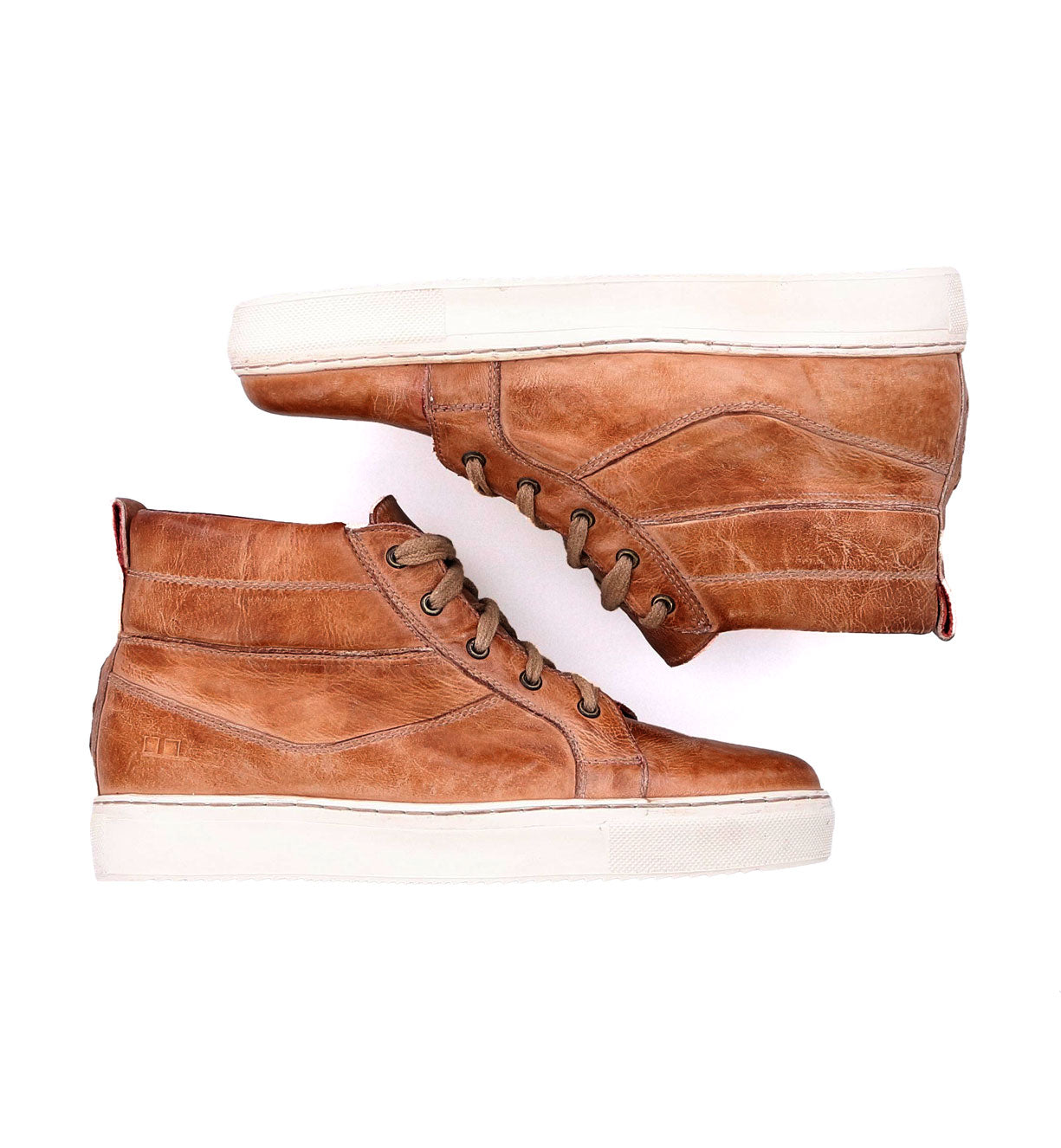 A pair of brown leather high top Rossela sneakers by Bed Stu on a white background.