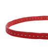 A Ruby leather belt with stitching on it. (Brand Name: Bed Stu)