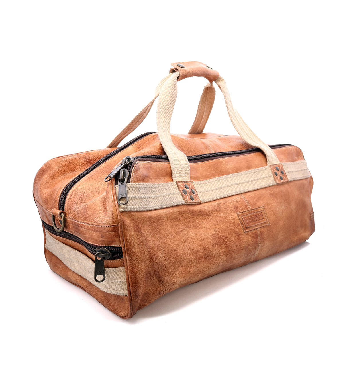 A Ruslan leather duffel bag by Bed Stu with two handles.
