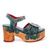 Dark teal Sabine sandals with a wooden platform, from the brand Bed Stu.