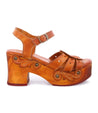 A women's tan Sabine sandal with a wooden platform by Bed Stu.