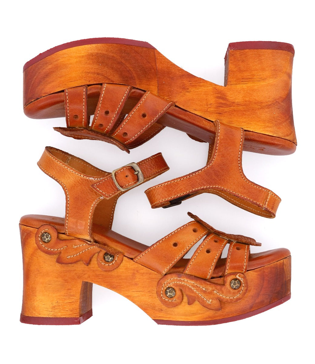 A pair of Bed Stu Sabine wooden sandals on a white background.