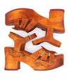 A pair of Bed Stu Sabine wooden sandals on a white background.