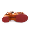 A women's tan Sabine sandal with a wooden platform by Bed Stu.