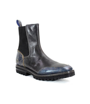 Introducing the Salatiel by Bed Stu: a stylish black leather Chelsea boot with distinctive blue textured accents, a rugged sole, and an elastic side panel. Designed for comfort, it includes a leather footbed perfect for all-day wear.