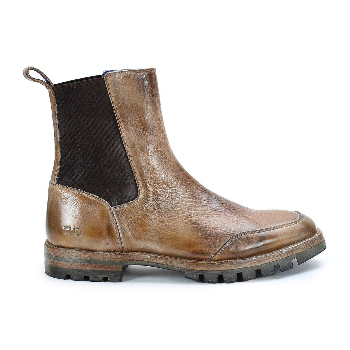 The Salatiel by Bed Stu is a brown leather Chelsea boot featuring a black elastic side panel and a textured sole, providing a rugged finish.