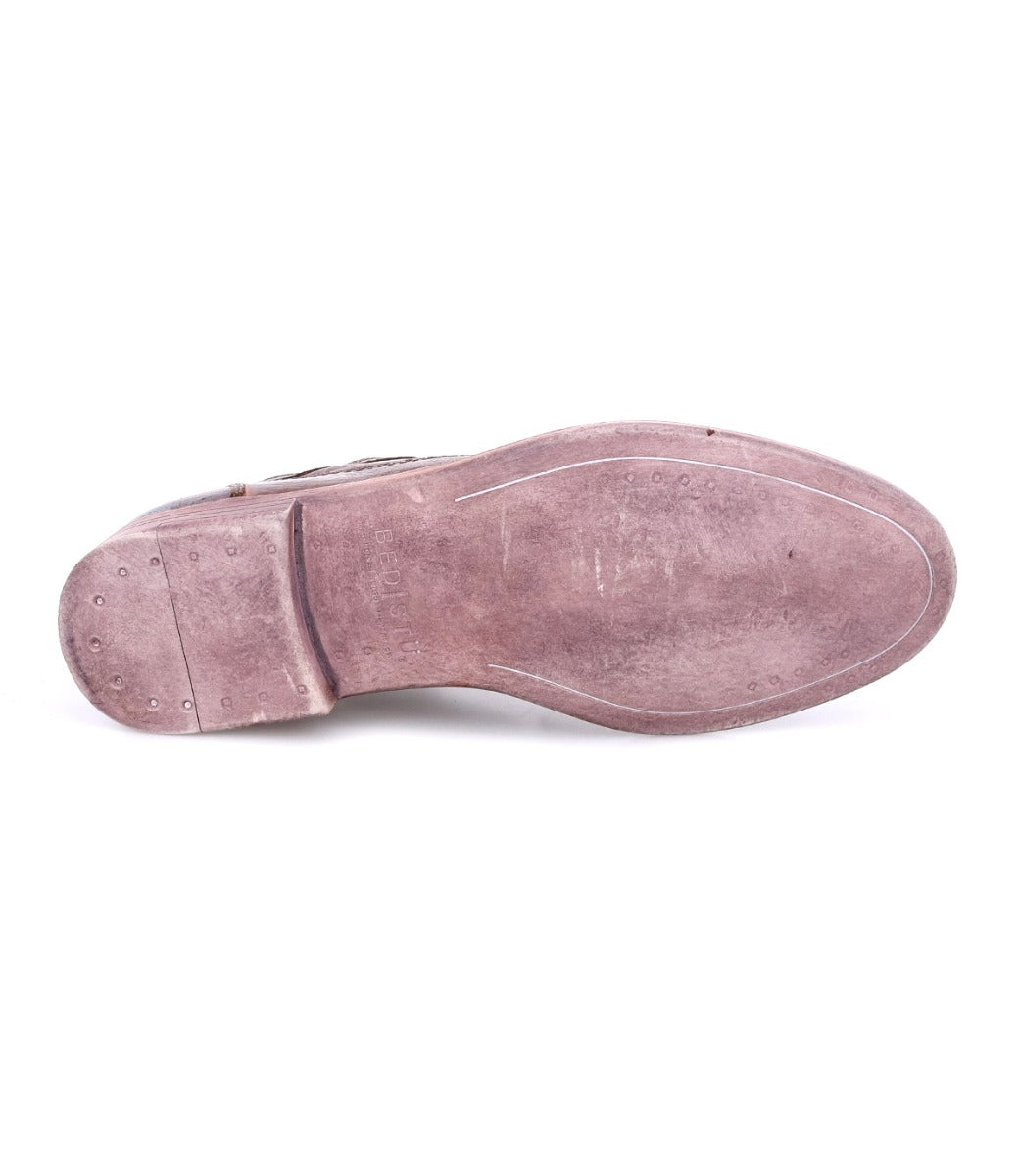 A pair of Sandro shoes with a brown sole by Bed Stu.