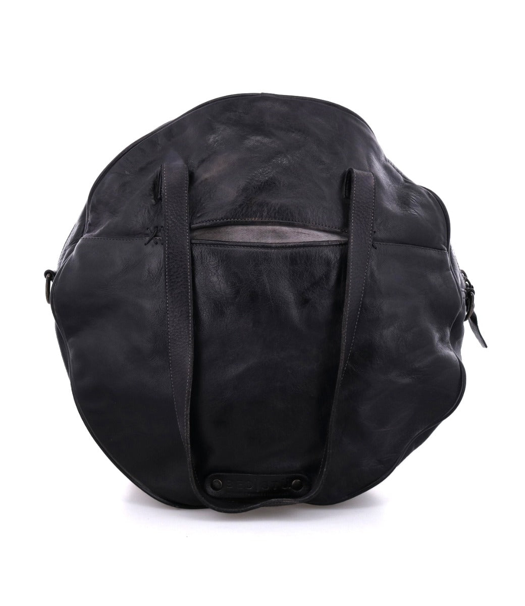 A Bed Stu Saray black leather duffel bag on a white background.
