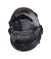 The inside of a Bed Stu black Saray bag with a zipper.