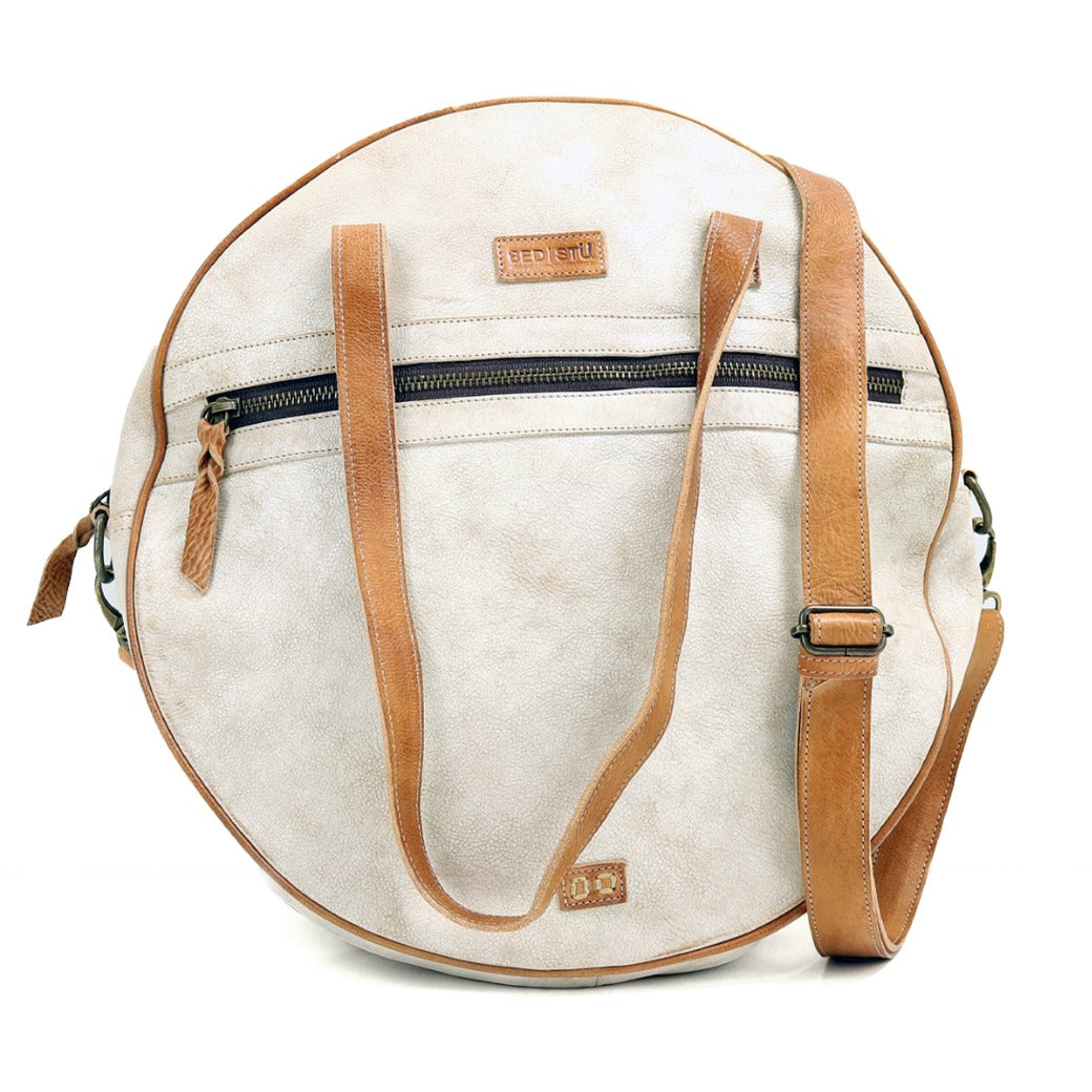 A white and tan Saray bag by Bed Stu with straps.