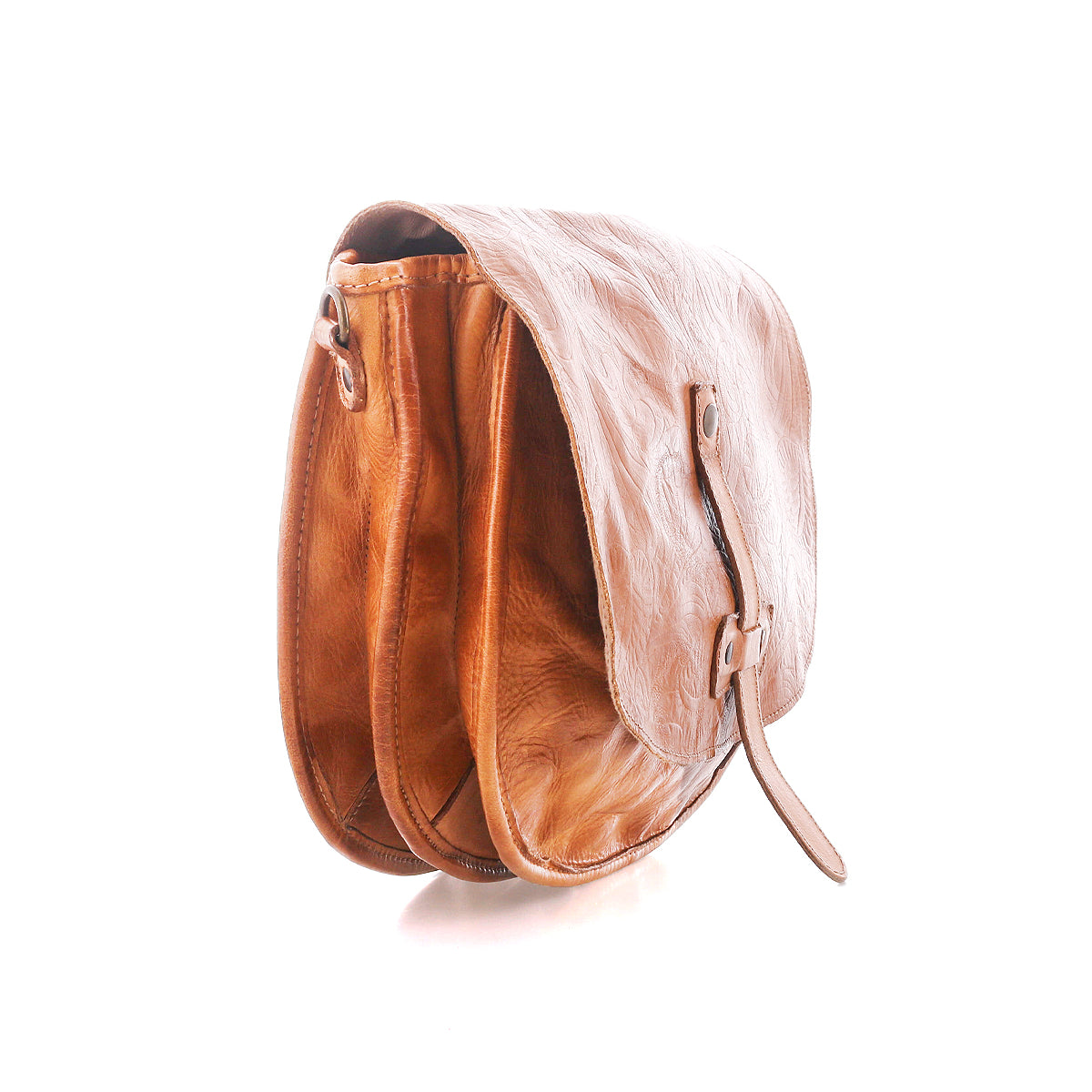 The Bed Stu Sequoia EM is a brown vegetable-tanned leather crossbody saddle bag with a flap closure, adjustable strap, and two main compartments, shown on a white background.