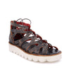 A women's Shirin II sandal with lace ups and a white sole by Bed Stu.