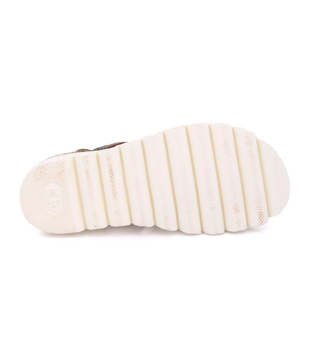 A pair of Bed Stu Shirin II shoes with a white sole on a white background.