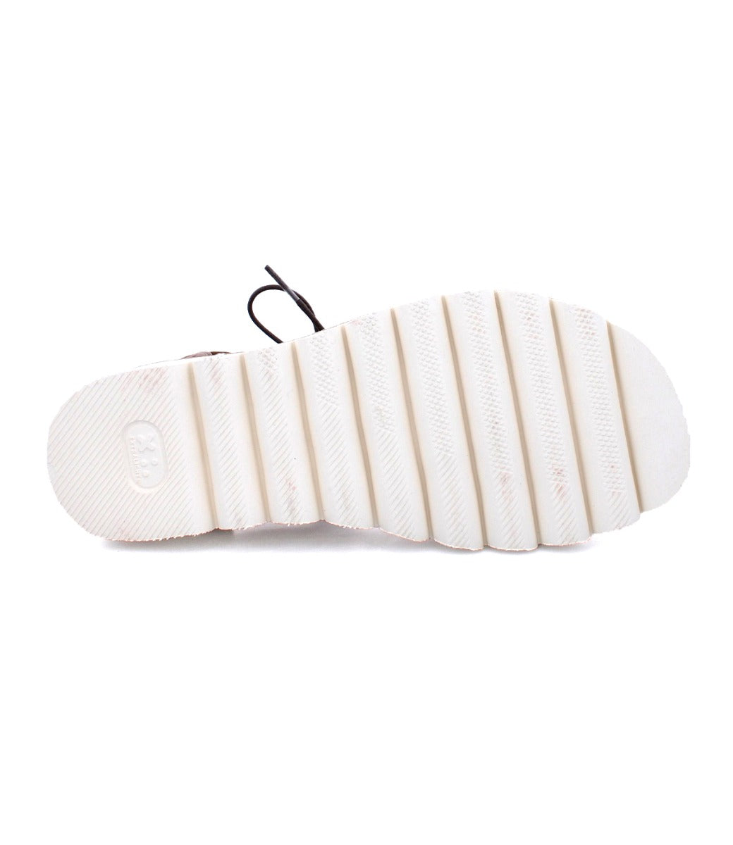 A pair of Bed Stu Shirin II sandals with a white sole.