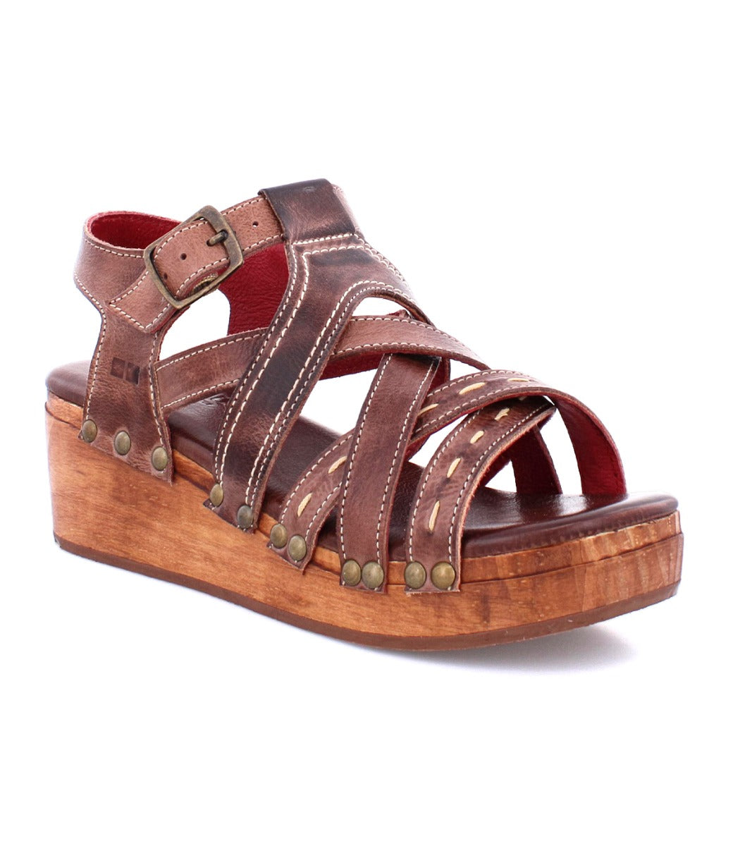 A women's Shirley sandal with a wooden platform and straps by Bed Stu.