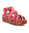 A women's red Shirley sandal with straps and wooden platform by Bed Stu.