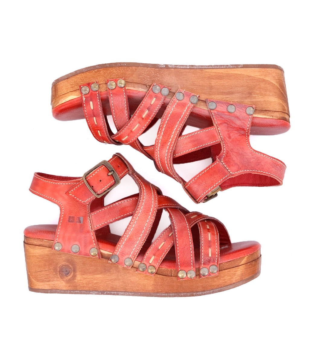 A pair of Shirley red sandals with wooden soles from Bed Stu.