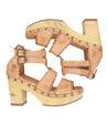 A pair of Sloane sandals with wooden straps by Bed Stu.