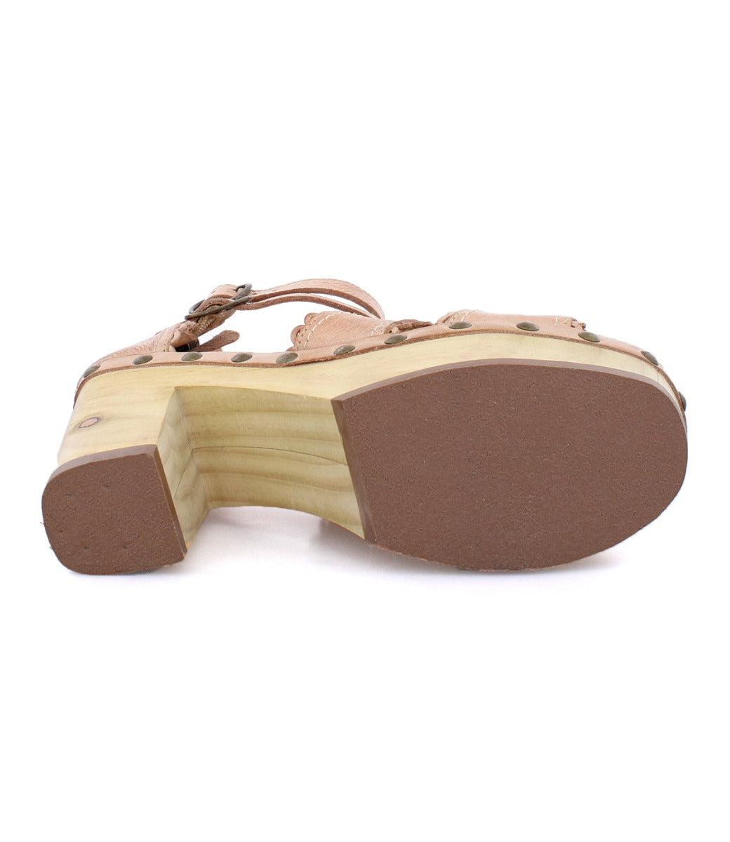 A pair of Bed Stu Sloane women's sandals with a wooden sole.