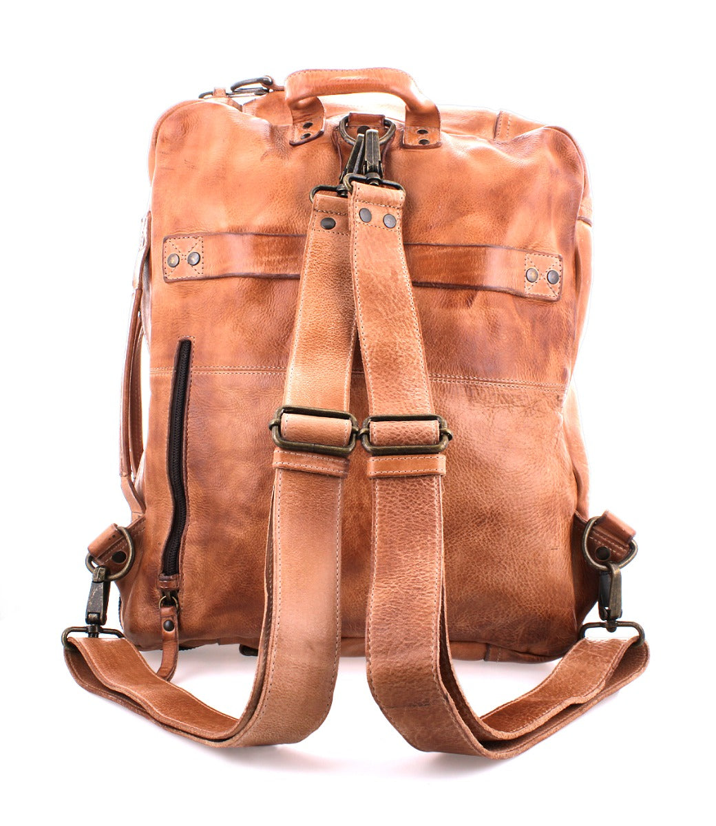 A brown leather Socrates backpack with straps and buckles by Bed Stu.