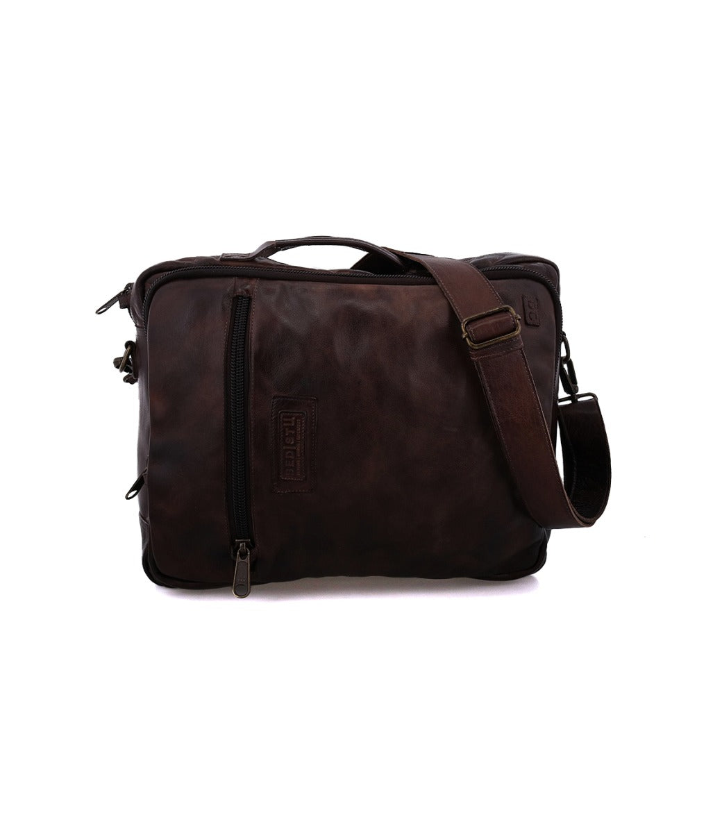 A brown leather Socrates messenger bag on a white background by Bed Stu.