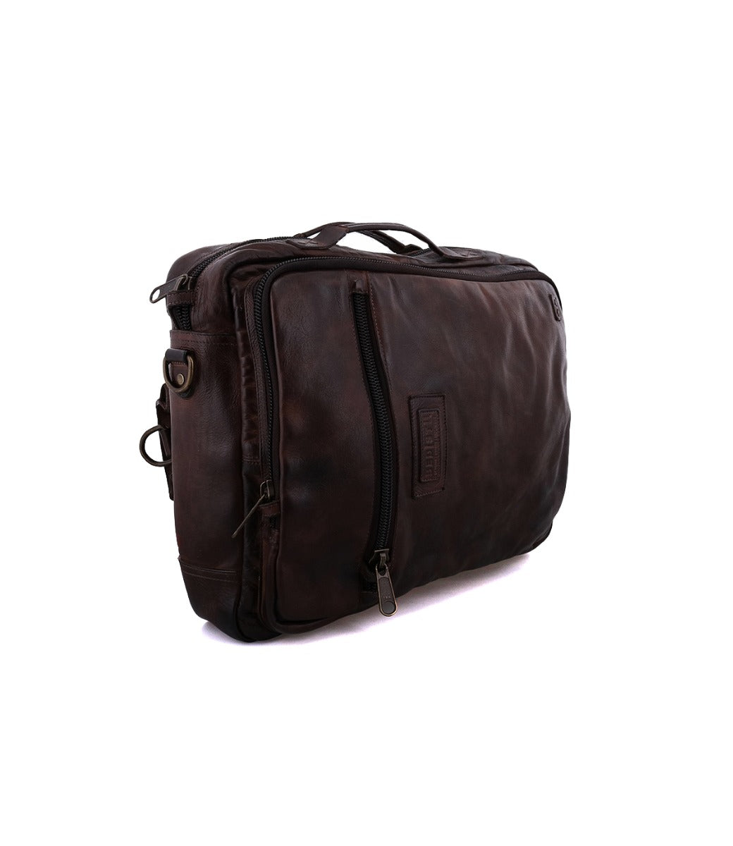 A brown leather Socrates laptop bag on a white background by Bed Stu.