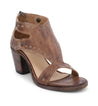A women's brown Sona sandal with studs and a wooden heel by Bed Stu.