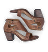 A pair of brown Sona leather sandals with studs on the heel by Bed Stu.