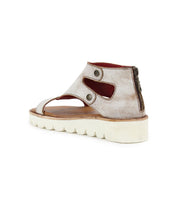 The Bed Stu Soni II sandal, viewed from a rear side angle, features a leather platform with an open-toe design, metal buttons, back zipper, and a thick white XL EXTRALIGHT® outsole.