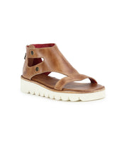 The Soni II by Bed Stu is a brown leather platform sandal featuring an ankle strap, open toes, button closure, and a back zipper. It includes a white ridged XL EXTRALIGHT® outsole for added comfort.