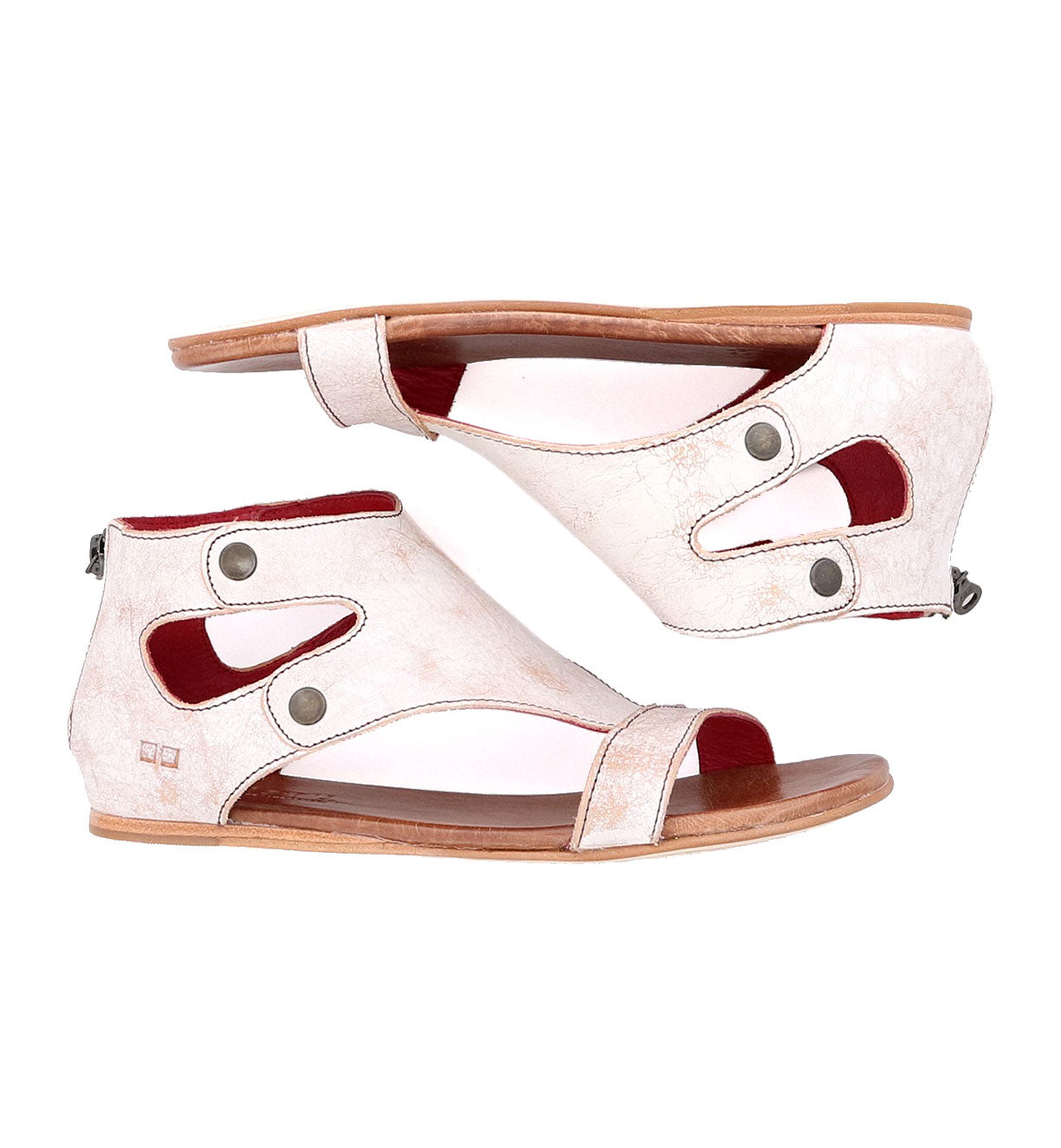 A pair of Bed Stu Soto women's white sandals.