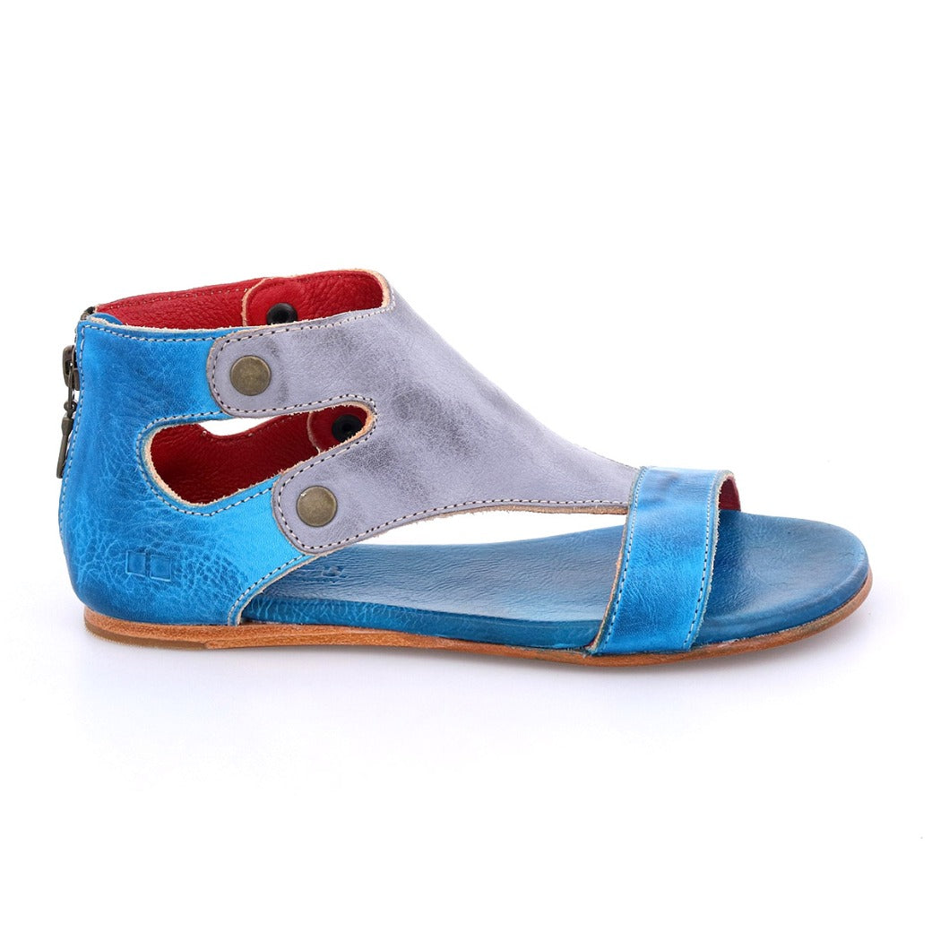A women's Bed Stu Soto blue leather sandal with red and blue accents.