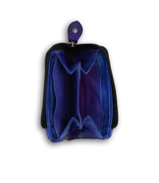 A small blue Carrie purse with a zipper on it from Bed Stu.
