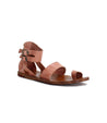 A women's pink Afrodita sandal with straps and buckles by Bed Stu.